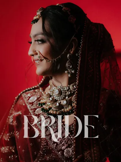 A powerful and dramatic portrait with the word 'BRIDE' overlaid. The red lighting and her confident profile create a striking and memorable image.