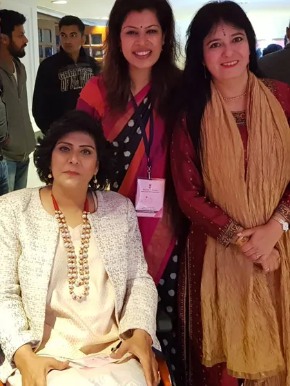 Sharing a moment with fellow awardees at the 'First Ladies Award' event.