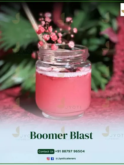 The 'Boomer Blast' is a perfect blend of flavors in every sip. This pink-hued drink, served in a cute jar, is a fun and nostalgic choice for any party.