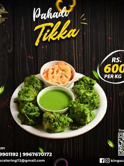 Another view of our Pahadi Tikka, served with green chutney and pickled onions. The vibrant green color comes from the fresh herbs used in the marinade.