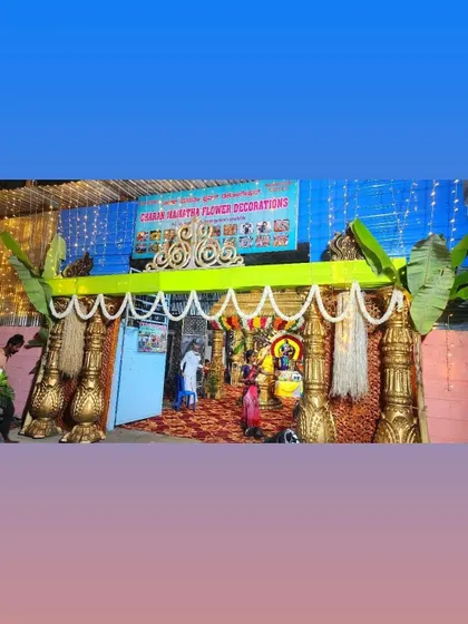 A temple entrance decorated for a festival. We teach our students how to work on live sites and handle the unique requirements of temple decorations.