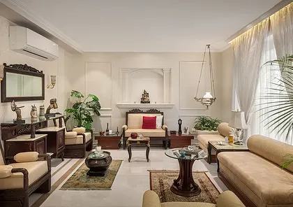 In this residence, I focused on creating a tranquil atmosphere through a neutral color palette and neo-classical elements. The design ensures a seamless transition between spaces, generous natural light, and a careful arrangement of traditional furniture.