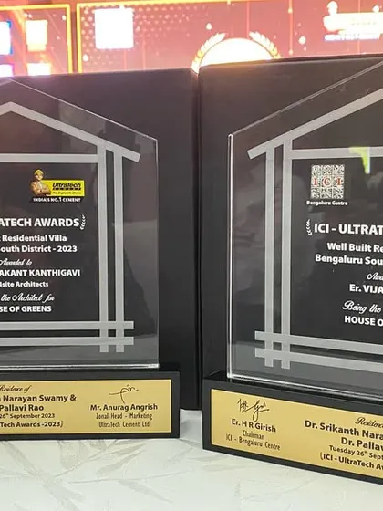 The trophies from the ICI-UltraTech Awards for "House of Greens," recognizing both the architectural design and the structural engineering.