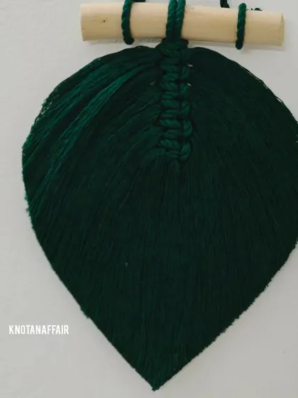 A pretty macrame leaf in a rich bottle green. This was part of a bulk order where the client planned to stitch them onto a curtain. They also look great as individual wall hangings.