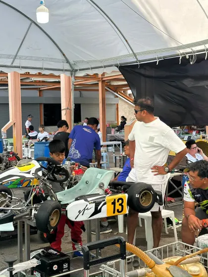 The pit area at the Rotax International Trophy Asia, with our team working on the karts.