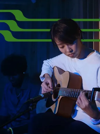 A student performs a complex fingerstyle guitar piece. Our lessons are tailored to help students achieve their specific musical goals.