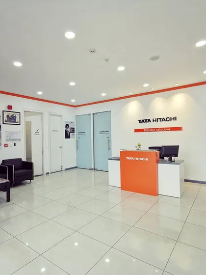 Another angle of the reception and waiting area. The layout is spacious and uncluttered, with comfortable seating for visitors and a clear line of sight to the reception desk.