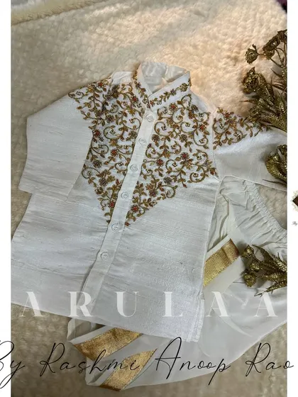 The full view of the handcrafted Jubba and Kacche. It's a perfect outfit for a little one for any traditional function.