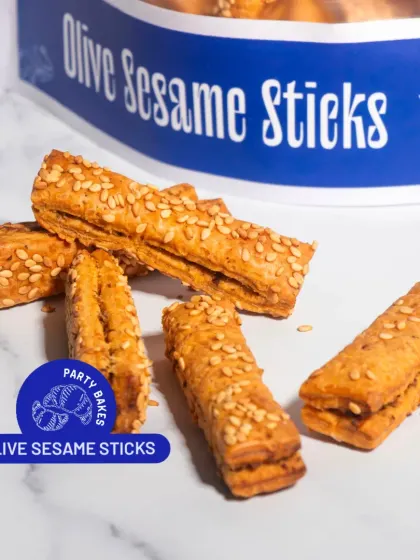 These Olive Sesame Sticks are addictively savoury. Made with flaky puff pastry, olive tapenade, and sesame seeds, they are a great snack to have on hand for any gathering.
