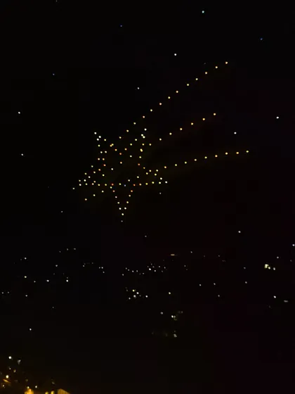 A shooting star in the night sky, symbolizing a wish come true. We use powerful, simple imagery to make your big day feel as magical and extraordinary as you've always dreamed.