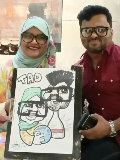 This couple's caricature from the TAO event was themed around bowling, their favorite hobby.