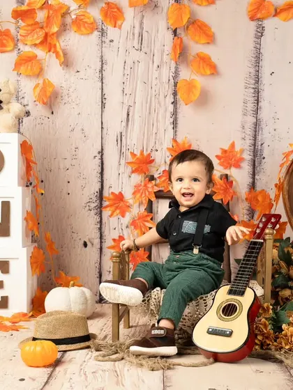 Another joyful shot from the autumn-themed session, full of smiles.