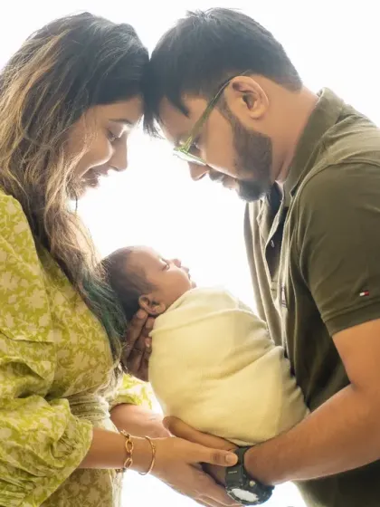 The first days as a new family are so precious. We use soft, natural-style lighting to capture the tender, quiet connection between new parents and their baby, preserving that incredible feeling of holding your whole world in your arms.