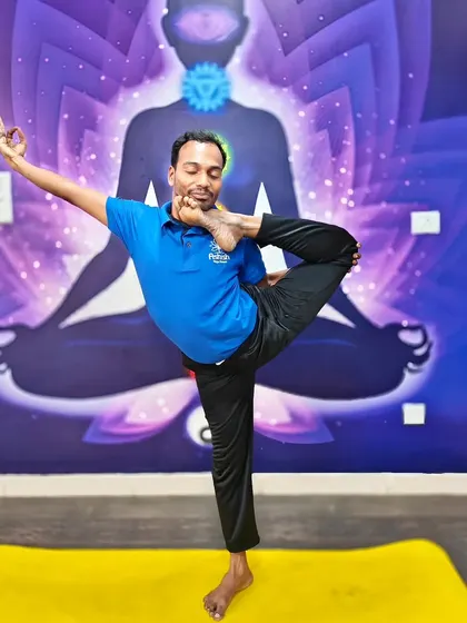 A beautiful standing balance pose, demonstrating grace, strength, and flexibility.