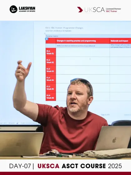 A UKSCA trainer explains the Module D paperwork, guiding participants through the process of documenting their coaching practice and program planning.