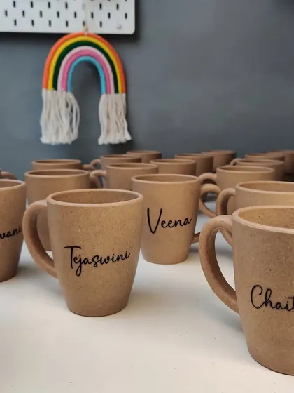 A batch of our custom-engraved bamboo husk mugs ready to go. They are a popular choice for corporate teams and as thoughtful, sustainable personal gifts.