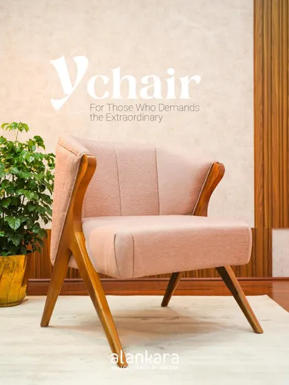 Another promotional shot of the Y-Chair, capturing its blend of modern design and classic materials.