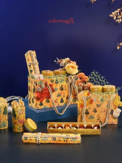 A closer look at our yellow forest-themed hamper set against a rich blue background. The intricate details and lively colors make this a truly joyful gift.