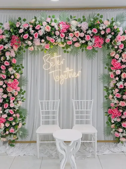 Our "Better Together" neon sign is a popular rental item for engagements, weddings, and anniversaries. It looks fantastic as a photo backdrop, especially when paired with a lush floral arch.