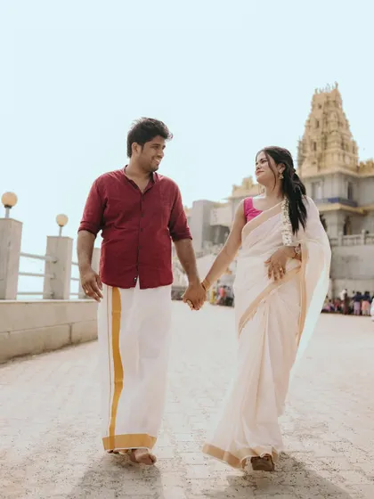 A happy walk together after a temple visit in Gokarna. Their simple, traditional South Indian outfits look elegant and beautiful.