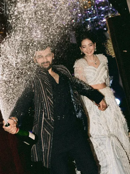 We live for the energy of a great party. Capturing the peak of the celebration, like this champagne pop for Anjali and Kushal, is about freezing a moment of pure, unfiltered joy. This is the vibe we bring to your sangeet or cocktail night.