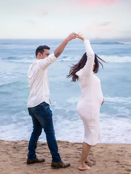A joyful, twirling dance on the beach. We love capturing movement and laughter to show the fun side of your relationship.