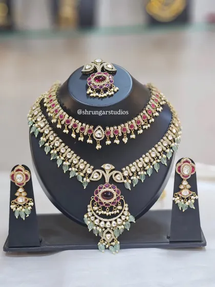 A beautiful AD set with ruby and mint green stones, perfect for a bride or bridesmaid.