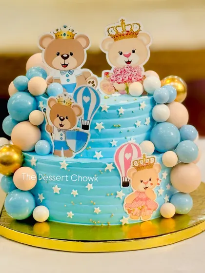 Another angle of the adorable teddy bear themed baby shower cake, showing the placement of the cute toppers and balloon details.