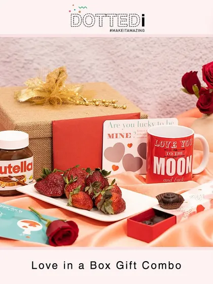 A perfect romantic gift, this "Love in a Box" set combines the classic pairing of strawberries and chocolate with a personalized mug and love notes.