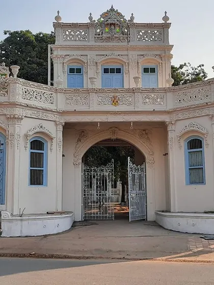 The restoration of Rhodesia House in Dharmaj, Gujarat, was a project of reviving not just a building, but a piece of the town's history. This daytime view shows the intricate facade, a blend of European and Indian architectural styles, brought back to its original grandeur to serve as a new cultural hub for the community.