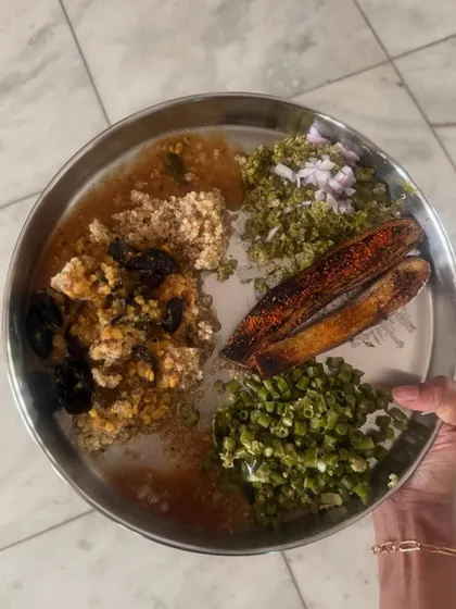 A vibrant home-cooked meal of bassaru palya, quinoa, and salad, a staple in my own diet that is both nourishing and satisfying.