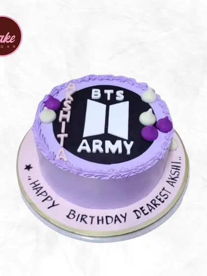 A cake for the BTS Army! This purple cake is decorated with the BTS and ARMY logos, perfect for a K-pop fan's birthday.