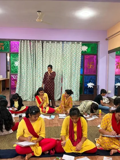 An instructor supervises the written theory examination, ensuring a disciplined and fair environment for all students.