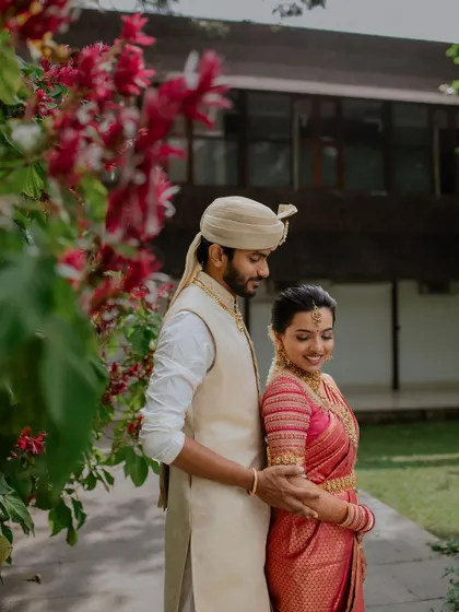 A gentle moment of affection against a backdrop of lush greenery. We love creating these serene and intimate couple portraits that you will cherish for a lifetime.