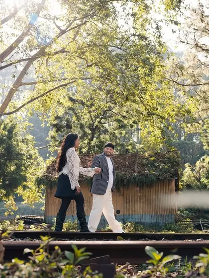 A playful moment on old railway tracks, with the morning sun filtering through the trees. This pre-wedding shoot was full of movement, laughter, and beautiful natural light.