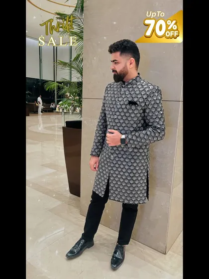 This modern patterned sherwani is a stylish choice for any groom. It's another fantastic piece available in my thrift sale.