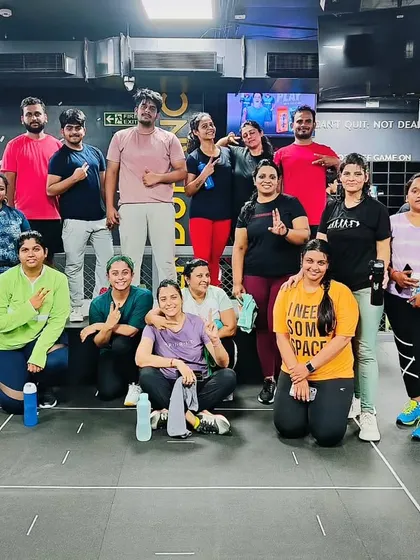 The heart and soul of my classes. Each photo captures a unique moment with my incredible community after a sweaty, joyful session. This is our shared victory lap.