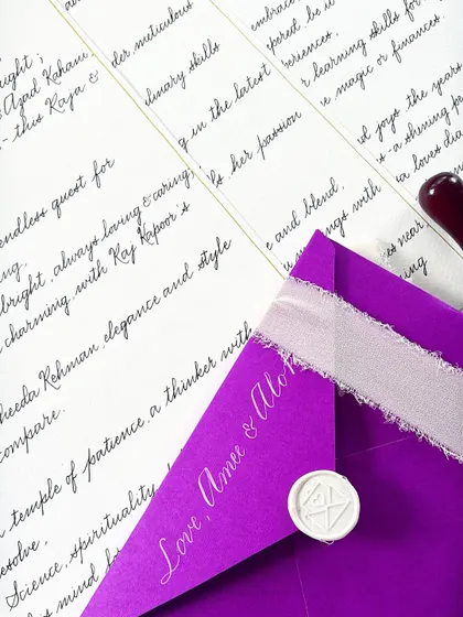 Words of nostalgia and warmth. Handwritten letters are carriers of deeply special messages. This one, with its vibrant purple envelope and silk ribbon, was curated with intention to remind the reader how important they are.