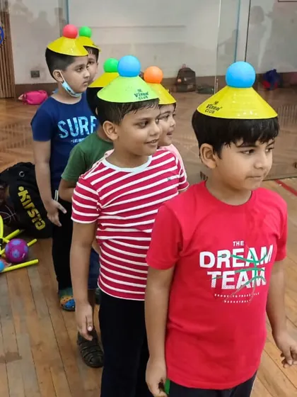 A fun balancing exercise for our youngest members. This activity helps improve focus, posture, and core stability in a playful way.