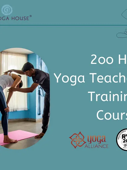 This image captures the essence of our hands-on approach. An instructor provides a gentle adjustment, ensuring the student finds the correct alignment in a forward bend, a fundamental part of our teaching methodology.