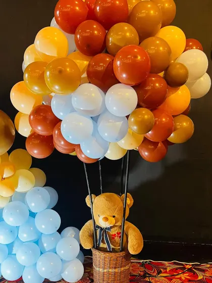 A teddy bear in a parachute, another creative prop I can provide for your themed party.