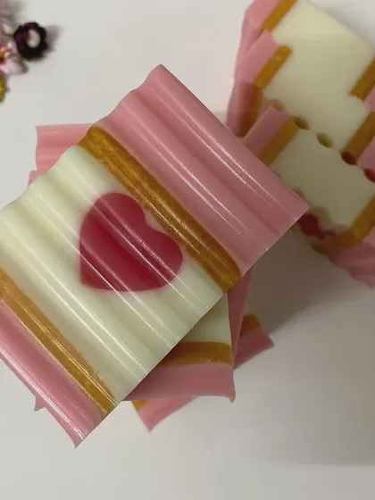 I love adding little details like this heart to my soap bars. This pink and white layered soap is not only pretty but also incredibly gentle, made with my signature paraben-free formula.