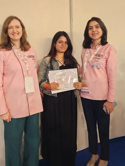 Posing with two of the judges after receiving my award. Their validation of my hard work means the world to me.