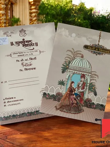 A classic Raja-Rani theme invitation with Marathi script, perfect for a traditional Maharashtrian wedding. The design captures the cultural essence of the ceremony.