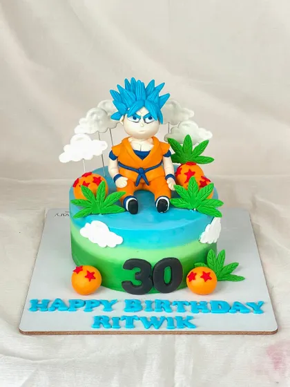 Powering up for Ritwik's 30th birthday with this Dragon Ball Z cake. It features a hand-sculpted Goku, ready for action on a colorful, two-toned cake.