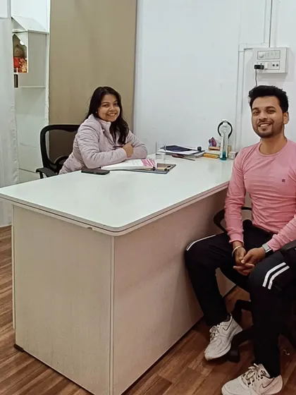 A happy client visits our Guwahati clinic for the second time for his skin and hair concerns. This image captures the comfortable and professional atmosphere during his consultation.