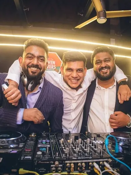 All smiles with the team behind the console. A successful New Year's Eve party is a massive team effort, and I'm grateful for my crew.