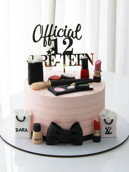A classic theme that never goes out of style: a makeup and shopping cake for a 12-year-old pre-teen, featuring edible lipsticks, makeup palettes, and designer shopping bags.