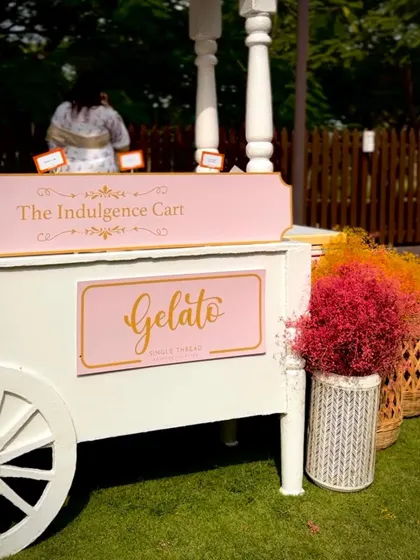 The "Indulgence Cart," my charming gelato station, ready to serve guests at an outdoor event. It adds a touch of whimsy and sweetness to the celebration.