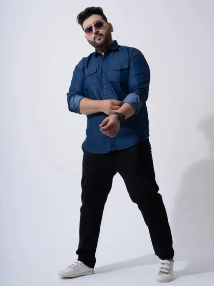 A confident pose for a men's fashion e-commerce shoot. I guide models to ensure their poses are flattering to the clothes and the brand image.